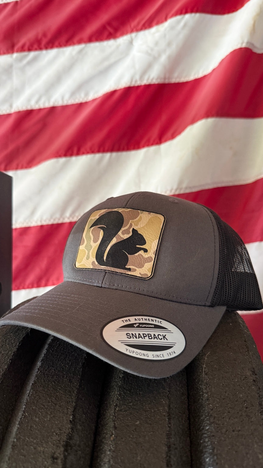 Big Squirrel Duck Camo Patch Trucker Hat in charcoal and black